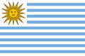 Primera bandera de Uruguay, utilizada entre 1828 y 1830. Las nueve barras o franjas celestes representaban a los departamentos.