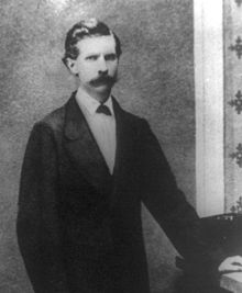 A black and white portrait of Stephenson during his time as Librarian of Congress