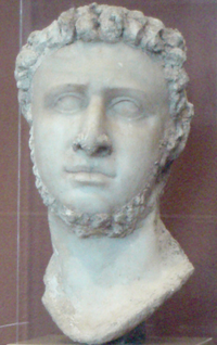 Marble statue head with stucco, likely originally of Ptolemy IX, then altered slightly by Ptolemy X