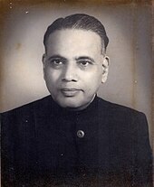 Black and white profile photograph of a man.