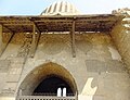 Southwestern façade, with remains of stucco decoration