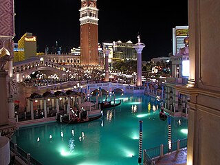 Another outside view of the front from the balcony, at night.