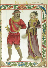 An elaborate border frames a full length illustration one would associate with a manuscript of a man and woman. The dark-skinned man dressed in a red tunic, breeches, and bandanna and wearing a gold chain is looking pleasantly over his shoulder in the direction of the fair woman who, garbed in a dark gold-fringed dress that covers the length of her body except her bare feet, has the faintest hints of a smile.