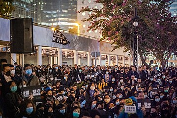 Protesters holding banners