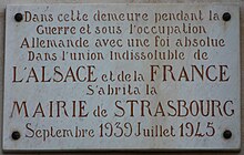 Photo d'une plaque commémorant l'installation de la mairie de Strasbourg à Périgueux de 1939 à 1945.