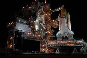 Discovery шаттл STS -114 миссияны ийилирини аллы бла кечеде