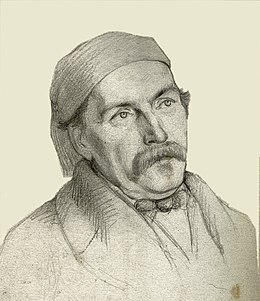 Buste dessiné de Félix Milliet. Il est en costume avec un ruban sur les cheveux. Il a la peau blanche, une bonne moustache et des cheveux courts.