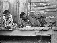 Florestine Carson, nezaměstnaný kreolský negroidní lovec a dcera, Plaquemines Parish, Louisiana, 1935