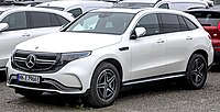 Front three-quarters view of a white crossover SUV