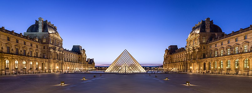 The Napoleon Courtyard and I. M. Pei's pyramid in its center, at dusk