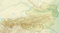 Mapa konturowa Austrii, na dole znajduje się czarny trójkącik z opisem „Alpy Gailtalskie”