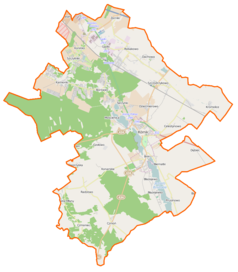 Mapa konturowa gminy Kórnik, w centrum znajduje się ikonka zamku z wieżą z opisem „Zamek w Kórniku”