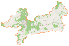 Mapa konturowa powiatu pilskiego, po prawej znajduje się punkt z opisem „Osiek nad Notecią”