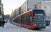 A light-rail vehicle on the Hämeenkatu street in Tampere