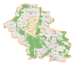 Mapa konturowa powiatu górowskiego, blisko centrum na prawo u góry znajduje się punkt z opisem „Pałac w Ligocie”