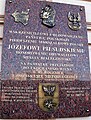 Tablet commemorating Jozef Pilsudski's train trips to Vilnius on the wall of the main Białystok railway station.