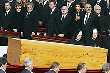 Pallbearers carry the casket of Pope John Paul II