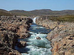 A river running in rocky land