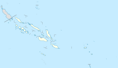 Mapa konturowa Wysp Salomona, blisko centrum na lewo znajduje się punkt z opisem „Honiara”