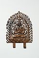 Bodhisattva aux mains jointes. Plaque bordée de flammes ajourées. Bronze doré, H. 24 cm, v. 680