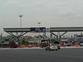 Petaling Jaya toll plaza of trip from Puchong to Petaling Jaya. The modern design is LDP standard design of toll plazas with electronic toll collection of cash lanes and Touch 'n Go lanes seen here. The SmartTAG lanes immediately next to Touch n Go lanes.