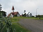 Museum (links) over Snorri Sturluson en kerkje (rechts) van Reykholt.