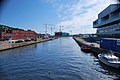 Akerselvas utløp sett fra kulverten der den kommer ut i Bjørvika. Paulsenkaia til venstre, Bjørvikautstikkeren til høyre, Sørengautbyggingen i midten, Sjømannsskolen til venstre i høyden Foto: Helge Høifødt