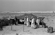 Nomads near a tent