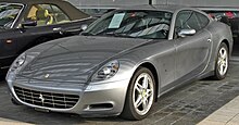 Front three-quarters view of a silver sports coupe