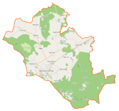 Mapa konturowa gminy Murowana Goślina, w centrum znajduje się punkt z opisem „Trojanowo”