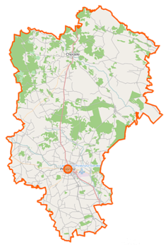 Mapa konturowa powiatu przasnyskiego, po prawej nieco u góry znajduje się punkt z opisem „Parafiaśw. Stanisława BMw Parciakach”