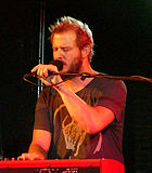 A close-up photograph of Justin Vernon