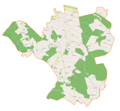 Mapa konturowa gminy Łopuszno, blisko centrum na prawo znajduje się punkt z opisem „Eustachów”