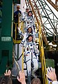 The TMA-04M crew wave to spectators before launch on May 15, 2012.