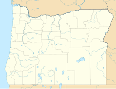 Mapa konturowa Oregonu, blisko lewej krawiędzi znajduje się punkt z opisem „Waldport”