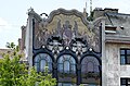 Gloire à la hongrie sur la façade de la Banque Török, par Miksa Róth. Parmi les anges et les bergers qui entourent la Vierge, l'artiste a représenté de grandes figures de l'histoire nationale tels que Ferenc Rákóczi , le conte István Széchenyi et Lajos Kossuth