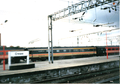 A picture of a Virgin Trains' MK 3 carriage at Crewe station in the year 2000. It is in its former Inter City livery. Most are now either renovated or scrapped. They were too old to use.