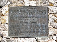 The plaque at Maclear's beacon at the highest point on Table Mountain (and the Cape Peninsula) at 1084 m. It commemorates Maclear's recalculation of the curvature of the Earth in the Southern Hemisphere. In 1750, Abbé Nicolas Louis de Lacaille had measured the curvature of a meridian arc northwards from Cape Town, to determine the figure of the Earth, and found that the curvature of the Earth was less in southern latitudes than at corresponding northern ones (i.e. that the Earth was slightly pear-shaped, with the wider bulge south of the equator). However, when Sir George Everest visited the Cape in 1820 and inspected the site of La Caille's measurements in Cape Town, he suggested to Maclear that the gravitational effect of Table Mountain could have caused a miscalculation of the curvature of the meridian. This was based on Everest's experience in the Himalayas. Taking this factor into account Maclear established the curvature of the Southern Hemisphere was in fact the same as that of the Northern Hemisphere.