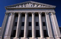 Justice the Guardian of Liberty, by Hermon Atkins MacNeil, over the eastern façade