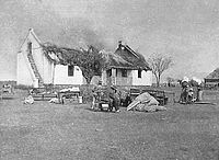 The burning of a Boer farm.