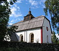 Mansarda de madeira en Suecia.