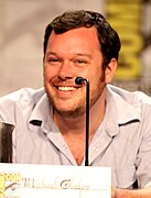 Michael Gladis dans le rôle de Paul Kinsey