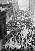 A crowd gathering on Wall Street after the 1929 stock market crash, which led to the Great Depression