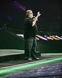 A man speaking into a microphone.