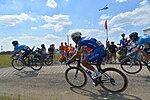 Philippe Gilberts gula ryggnummerlapp visar att Quick-Step Floors ledde lagtävlingen inför etapp 9 av Tour de France 2018.