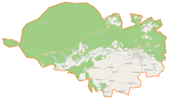 Mapa konturowa gminy Wronki, blisko centrum u góry znajduje się punkt z opisem „Mokrz”