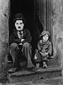 Image 4Charlie Chaplin in his 1921 film The Kid, with Jackie Coogan. (from 20th century)