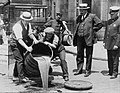 Image 9Prohibition agents emptying barrels of alcohol (from 1920s)