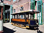 Elektrische motorwagen 2 (ex-Gemeentetram Amsterdam 72) als replica teruggebracht in de uitvoering van 1904 in het Haags Openbaar Vervoer Museum.