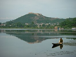 View of the Nigeen lake with Hari Parbat hill in the background